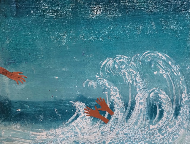 One person saving another one from drowning.